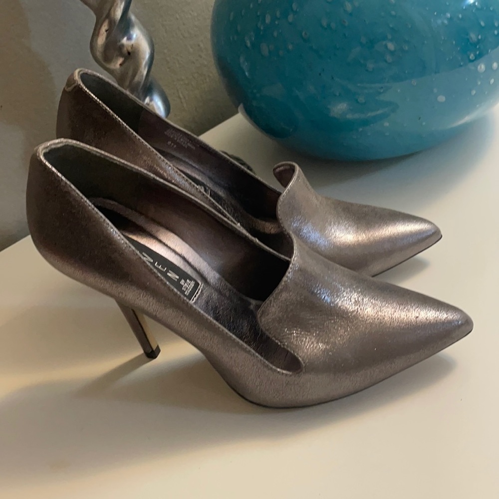 Worn once,color silver gray size 8